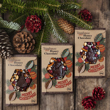 Honey Chocolate Christmas bars sugar free, made with local honey and organic cacao, dark, wit fruit and nuts, only healthy ingredients.