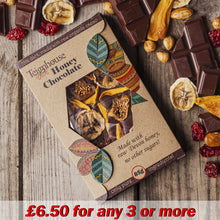 Raw chocolate bar made with raw local honey organic cacao and dried tropical fruit, dark, healthy, only natural ingredients