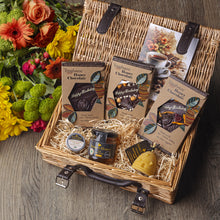 Happy birthday gift basket containing Teignhouse honey chocolate, Stones honey, lip balm and raw Devon honey