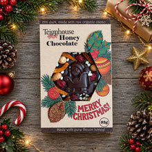 Honey Chocolate Christmas bars sugar free, made with local honey and organic cacao, dark, topped with fruit and nuts, only healthy ingredients.