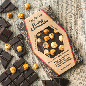 Honey Chocolate bar topped with hazelnuts, no sugar added, made with raw honey and organic cacao