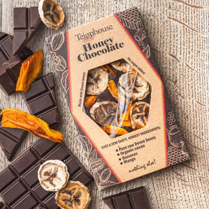 Honey Chocolate bar topped with bananas and mango, no sugar added, made with raw honey and organic cacao