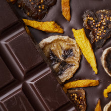 Honey Dark Chocolate made with organic raw cacao and local Devon honey no sugar added, dark, raw, topped with bananas and mango